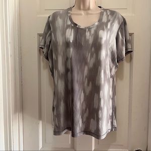 Under Armor workout top with stretchy material